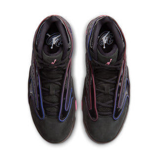 Top view of black Air Jordan sneakers with purple trim and pink tongue logos