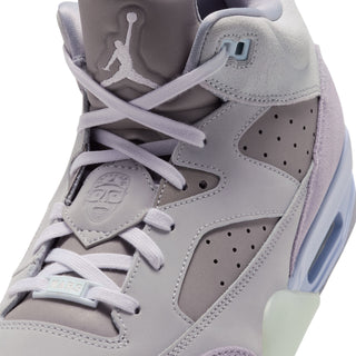 Men's sneaker close-up: light gray upper, lilac collar trim, white laces, perforated toe.