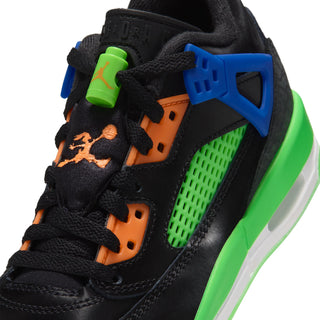 Youth low-top sneaker upper close-up: black mesh with blue cage and orange lace eyelets