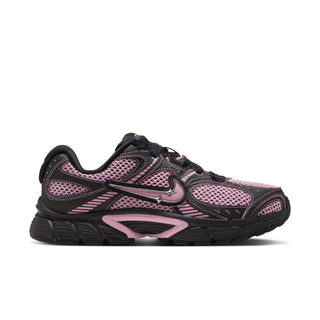 Women’s lace-up running sneaker in black with pink mesh panels and chunky rubber sole