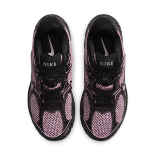 Black and pink Nike running sneakers with lace-up front and padded collar