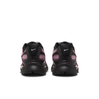 Black Nike sneakers with pink accents and patterned heel panels, lace-up