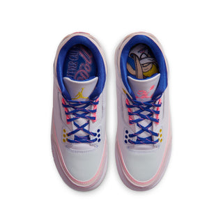 Youth retro sneakers top view, white leather with blue laces and multicolor eyelets