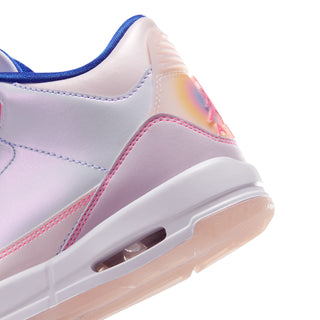 Youth retro sneakers close-up, white sidewall with pink trim and visible air unit