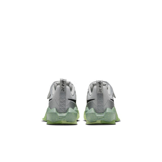 Kids light-gray sneaker with neon-green outsole, back view with heel tabs