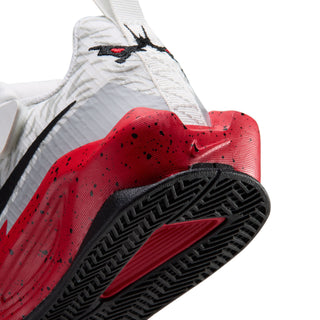 Kids' basketball shoe side with white upper, black swoosh, and red heel panel