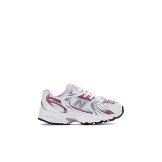 Toddler sneakers three-quarter view, white upper with pink swoop accents and laces