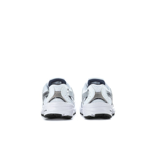 Toddler New Balance sneakers, white with navy lining, rear view of two shoes