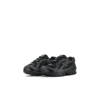 Toddler black sneakers side angle, lace-up with visible logo and sculpted tread sole