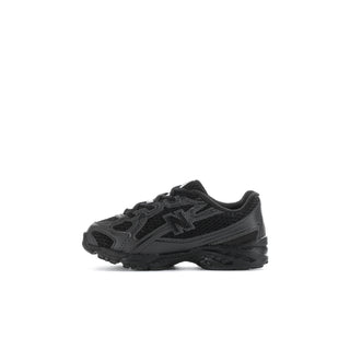 Toddler black low-top sneakers, lace-up style with side logo and chunky cushioning sole