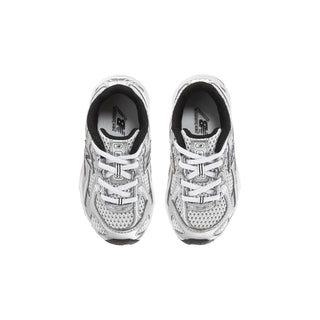 Toddler lace-up sneakers in silver metallic with black inner lining and 'N' emblem