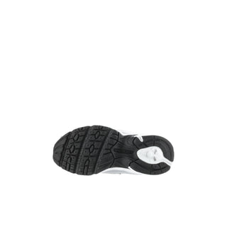 Toddler silver metallic sneakers showing textured outsole and black heel section