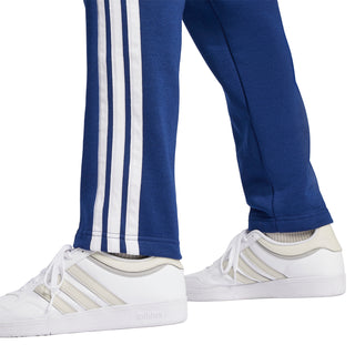 Dark blue fleece pants with long white vertical stripe legs