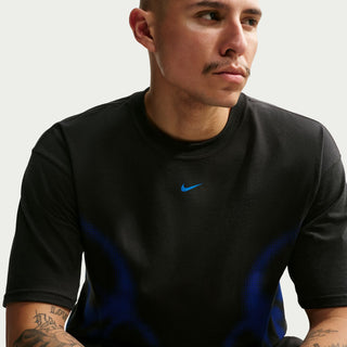 Men's black crew-neck tee with blue flame graphic and Nike swoosh, close-up