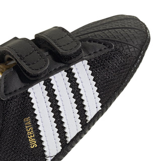 Infant black adidas Superstar sneaker, white three stripes, hook-and-loop strap