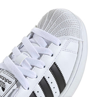 Youth adidas Superstar II sneaker close-up, white upper with black triple-stripe detail