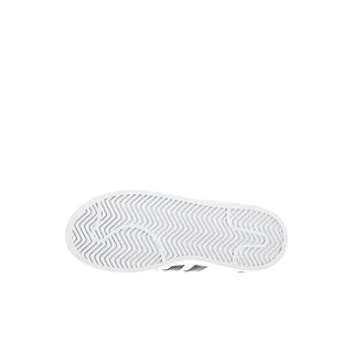 Kids' white rubber outsole with textured tread for grip.