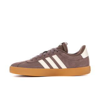 Women’s suede court sneaker side view, taupe upper with white stripes and gum sole