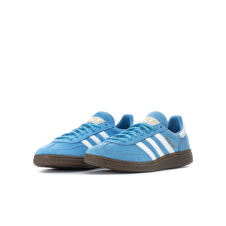 Light blue youth adidas sneakers, white stripes, brown gum sole, side-by-side view