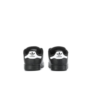 Toddlers' black and white adidas sneakers, heel view with white stripe detailing