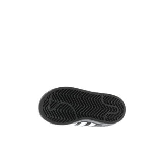 Toddlers' black sneaker outsole with textured tread and partial white stripes