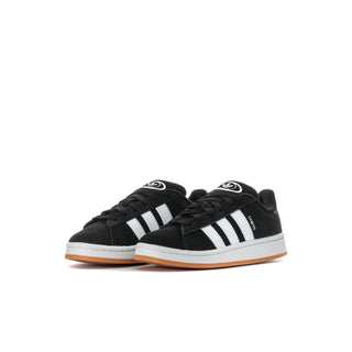 Kids black low-top sneakers with white striped design, laces, and gum sole