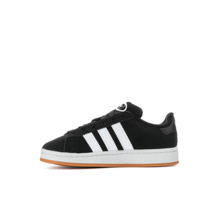 Kids black adidas-style sneaker with three white stripes and gum outsole
