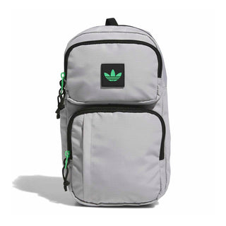 Light grey sling bag with black trim, green pull tabs, front patch logo, top handle