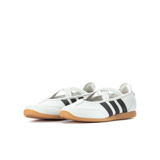 Youth white Mary Jane sneakers with black stripes and crossed lace strap, gum sole