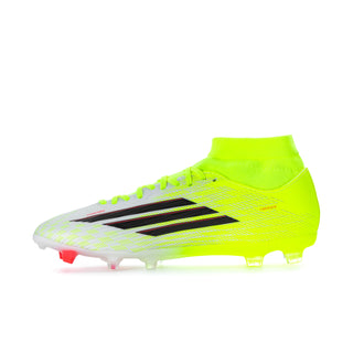 Men's mid-cut football boot, neon yellow upper with black stripes, red cleat tips