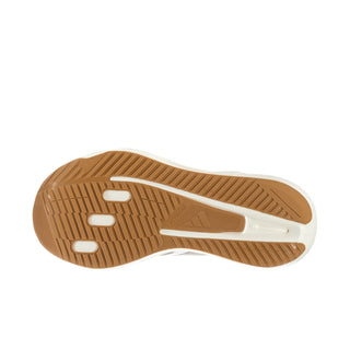 Women's running shoe outsole with tan traction pattern and white midsole