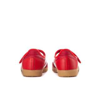 Red adidas sneakers rear view with hook-and-loop strap and gum sole.