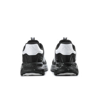 Men's black sneakers with white heel panel, rear view, cushioned collar
