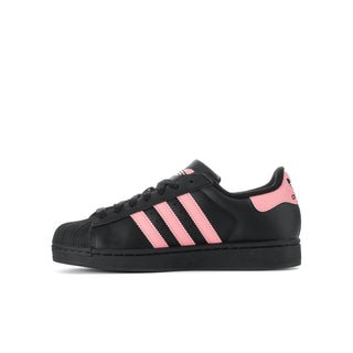 Kids adidas Superstar II sneakers side view, black leather-look with pink 3-stripe detailing