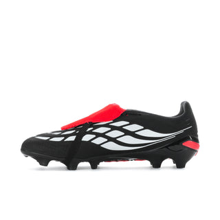 Black soccer cleats with white cage stripes, red top strap, and FG/MG studs