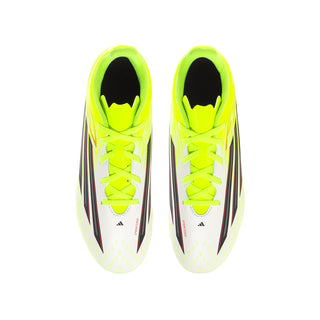 Pair of youth neon yellow soccer cleats with white laces and black/red graphic stripes, FG