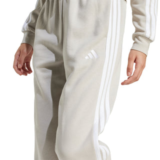Womens light beige track pants with white 3-Stripes and small logo on thigh