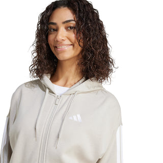 Women's light gray full-zip hoodie with hood, drawstrings, and small chest logo