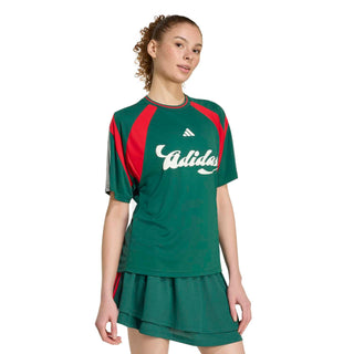 Womens dark green tennis dress with red panels, white adidas logo, and tiered skirt