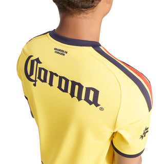Yellow mens soccer home jersey back detail with large Corona sponsor text