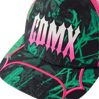 Black camo trucker cap front with green pattern and pink piping, bold dripping graphic