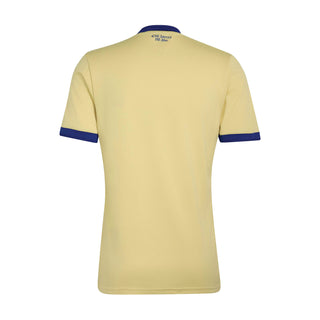 Men's powder yellow soccer jersey with blue sleeve cuffs and collar trim, plain back