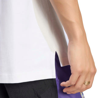 Detail of men’s white tee with purple inner stripe and black side panel