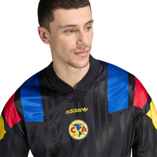 Black soccer jersey neckline with adidas logo and Club America crest, colorful shoulder accents