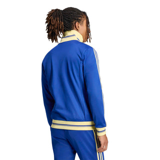 Mens blue track jacket back view with gold stripe panels and ribbed waist band