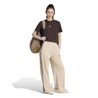 Womens beige track pants with animal-print 3-stripe accents and wide legs