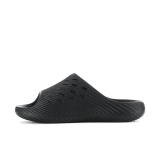 Men's black slide sandals with ridged footbed texture and slotted outsole