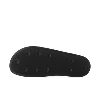 Black slide sandal outsole with raised traction nubs