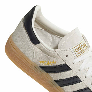 Women's adidas Spezial side view, white upper with black stripes and Spezial branding