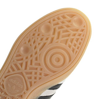 Women's adidas Spezial outsole detail, tan rubber tread with circular adidas mark